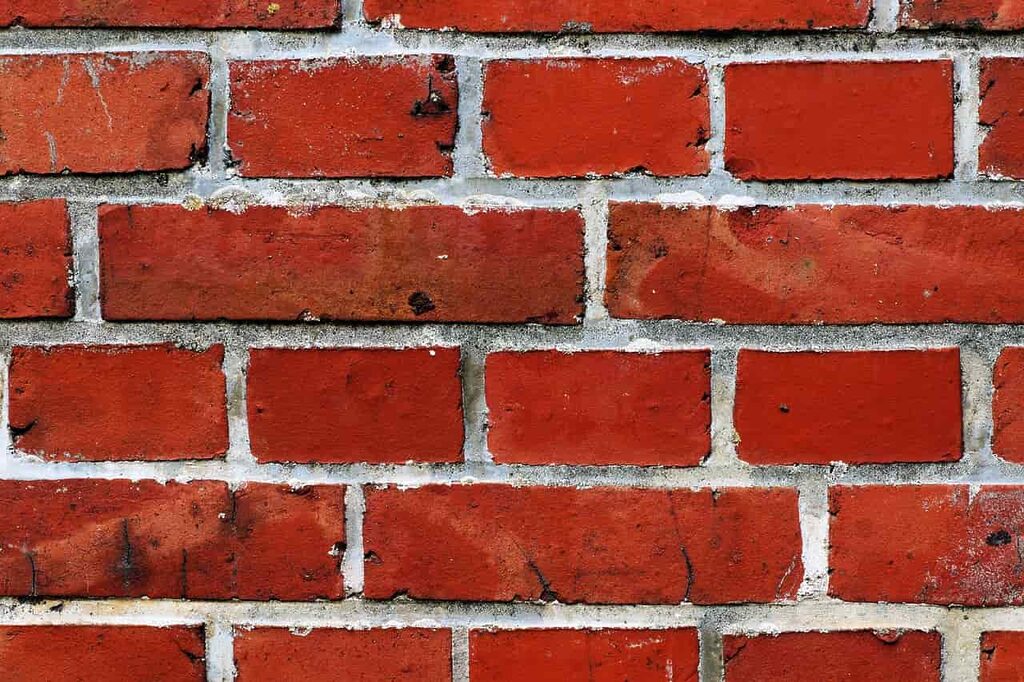gros plan d'un mur de brique rouge 